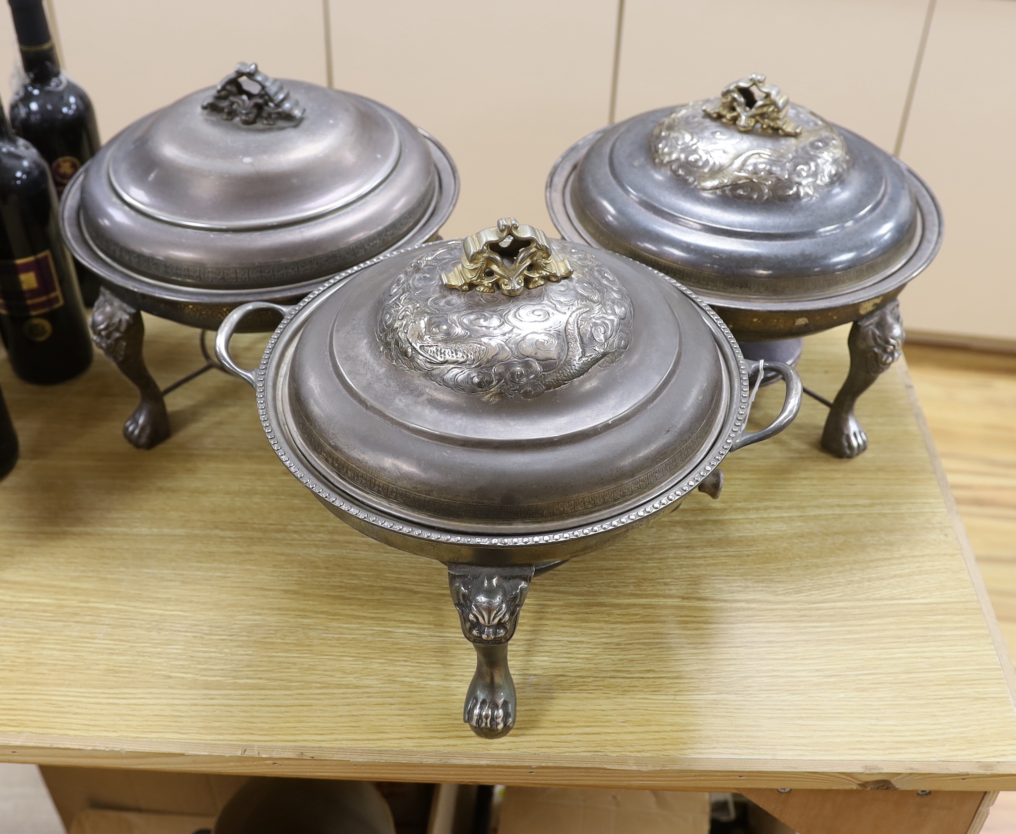A pair of Chinese tureens, stands, burners and another similar, 30cm tall
